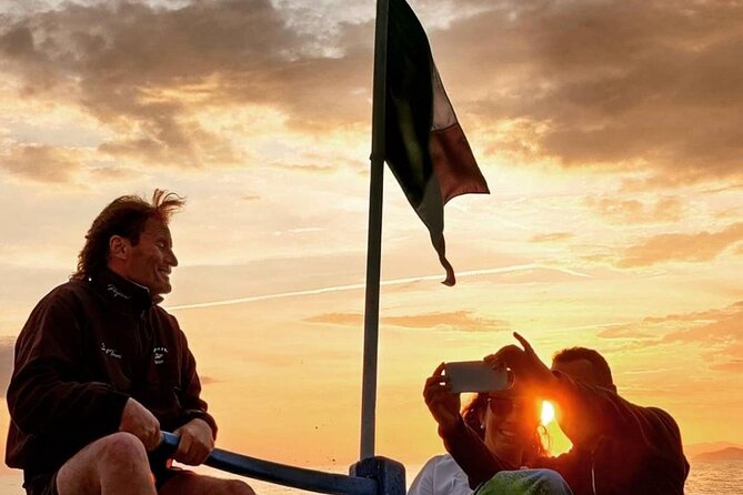 Sunset Boat Tour to Cinque Terre with aperitif on board - Vernazza and Manarola at golden hour: watching villages slide into view