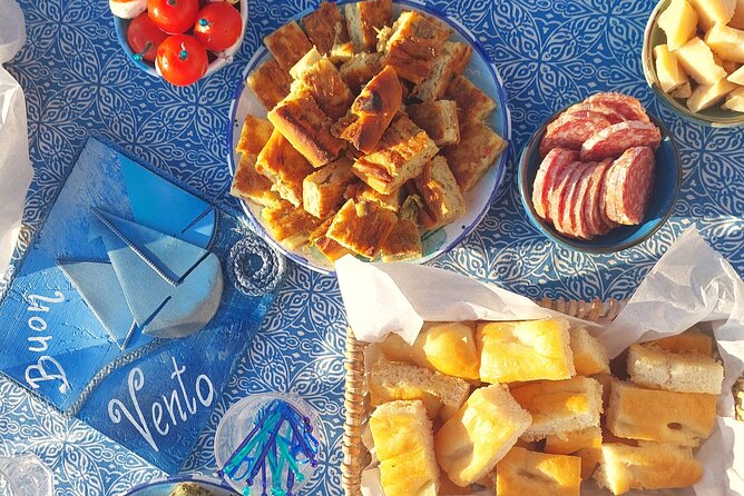Sunset Cinque Terre Boat Tour with a traditional ligurian gozzo from Monterosso - Aperitivo on board: local snacks, prosecco, and a crew-made mood