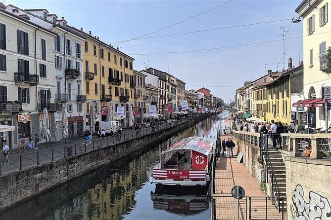 Sunset Navigli Boat Tour in Milan with Optional Aperitivo - Passing the Baroque riverside church and the wedding-famous Gothic-Romanesque church