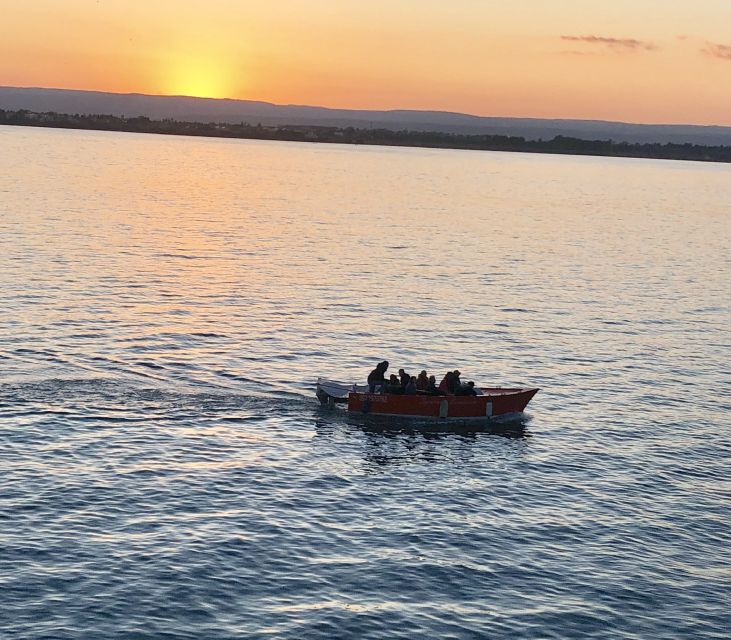 Syracuse: Boat Trip of Ortigia Island and Sea Caves - The Skipper’s Live Talk: Stories in English and Italian