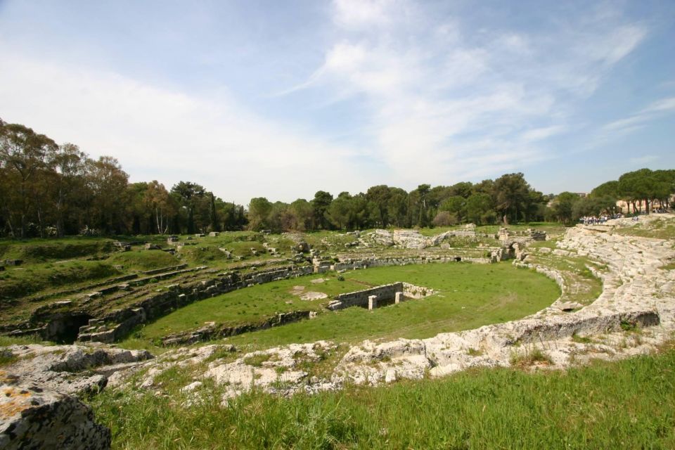 Syracuse: Neapolis and Greek Theater guided tour - Latomie del Paradiso: quarry work turned into quiet garden rooms