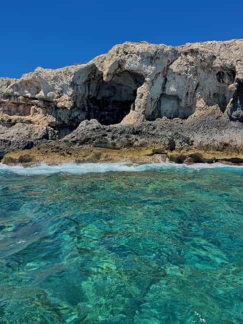 Syracuse: Ortigia Island and Sea Caves Boat Tour with Drinks - Castello Maniace and Ortigia’s seafront: seeing monuments from the right angle