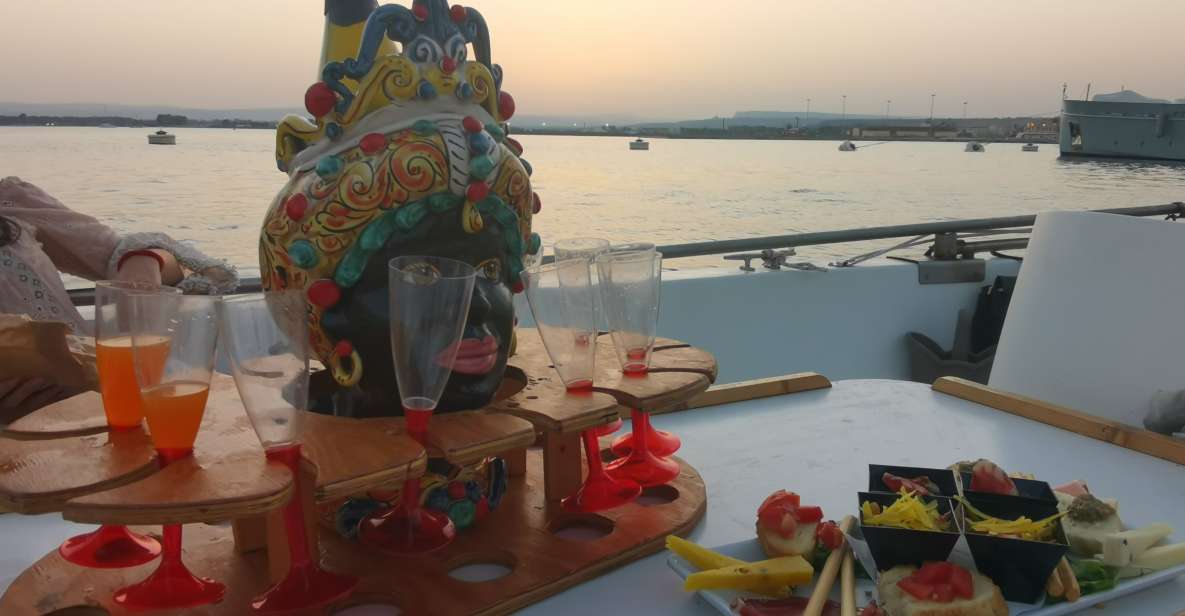 Syracuse: Ortigia Sunset Cruise with Aperitif - The route in plain English: Capuchin Coves to coral grottoes to stalactites