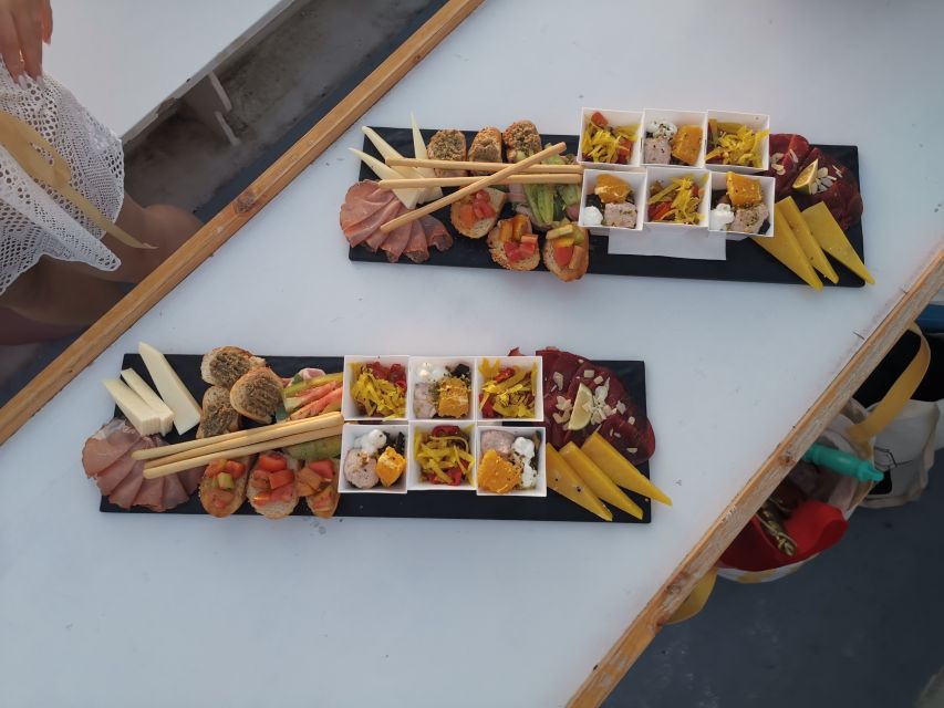 Syracuse: Ortigia Sunset Cruise with Aperitif - Swim stop near Maniace Castle: the part everyone remembers