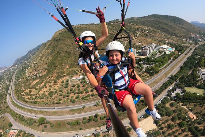Tandem Paragliding Flight in Cefalù - After Landing: GoPro Footage Sent to Your Phone