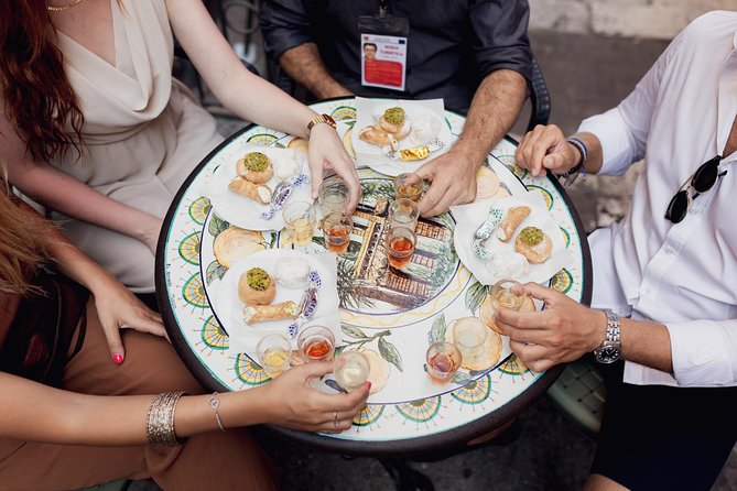 Taormina Food and Wine Walking Tour (Small Group or Private) - Stop 2: a classic Sicilian wine bar with red pours and land-food bites