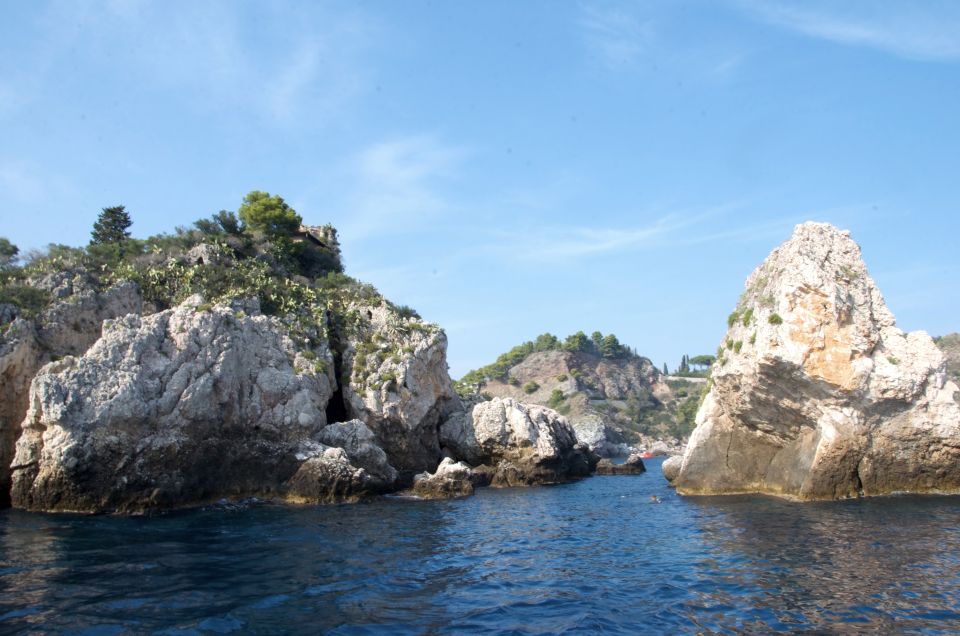 Taormina: White Lotus Tour - Cruising to Isola Bella: aperitif, dolphins, and the first big views