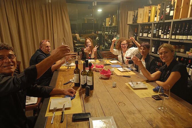 Taste of Lake Como: 4 Wines Paired with Local Cheese Charcuterie - Stop Feel: Capitan Drake and the Small-Shop Wine Wall Vibe