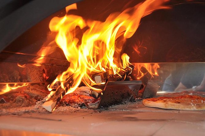 Toss, Bake, Cheers! - Sorrento Pizza Making Class with Wine - Assembling your pizza and getting it to the oven