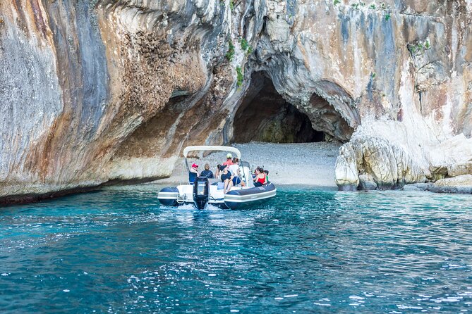 Tour along the coast of Baunei: a unique experience - The Dinghy Ride Itself: Bumpy Water, Ladder Steps, and Safety