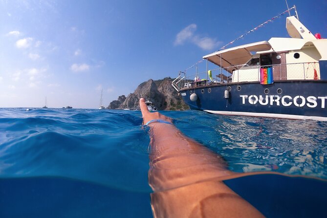 Tour of the Costa degli Dei by boat, 3 hours with aperitif included - Stop-by-stop: the grotto colors and the Riaci rock-bay swim