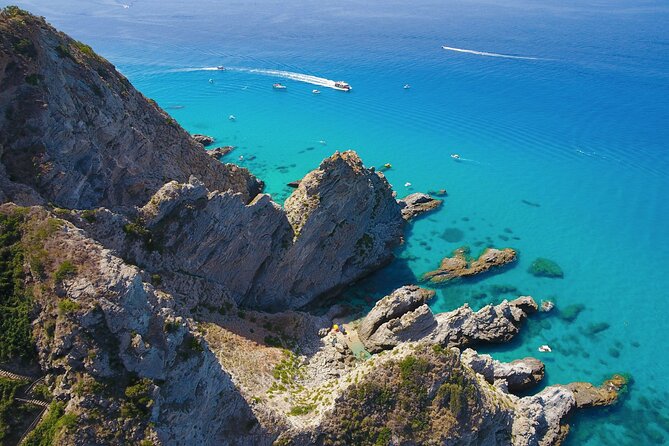 Tour of the Costa degli Dei by boat, 3 hours with aperitif included - Grotticelle Beach: where the water turns into a fish-viewing window
