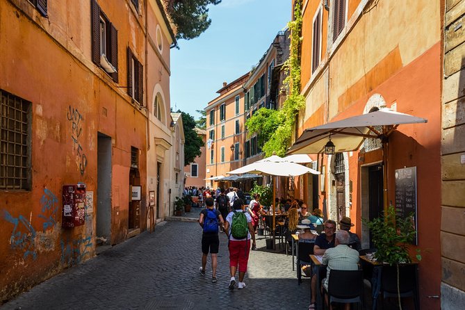 Trastevere and Rome's Jewish Ghetto Half-Day Walking Tour - Isola Tiberina crossing: synagogue exterior views and bridge panoramas