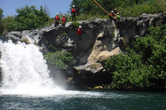 TuffAlcantara - dives, slides and lots of fun in the Alcantara river - Guide energy in the canyon: Mario, Miguel, and Michele