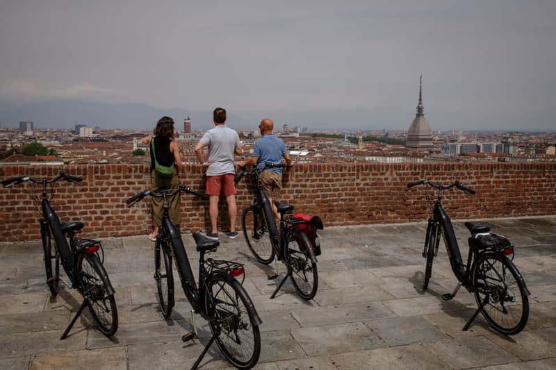 Turin: City Highlights Guided E-Bike Tour - Po river bridge crossing and Valentino Park’s local vibe