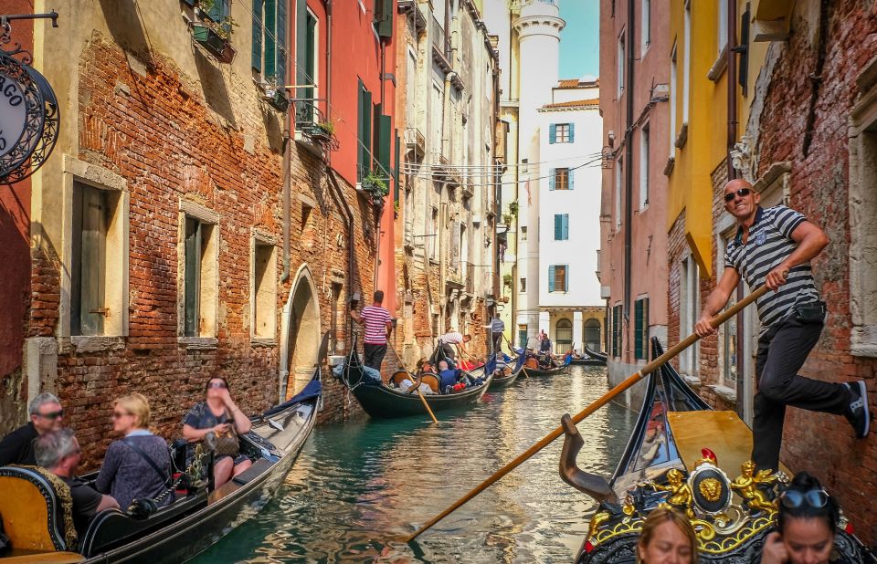 Venice: Shared Gondola Ride through the Lagoon City - Teatro La Fenice: a theater landmark seen from its element