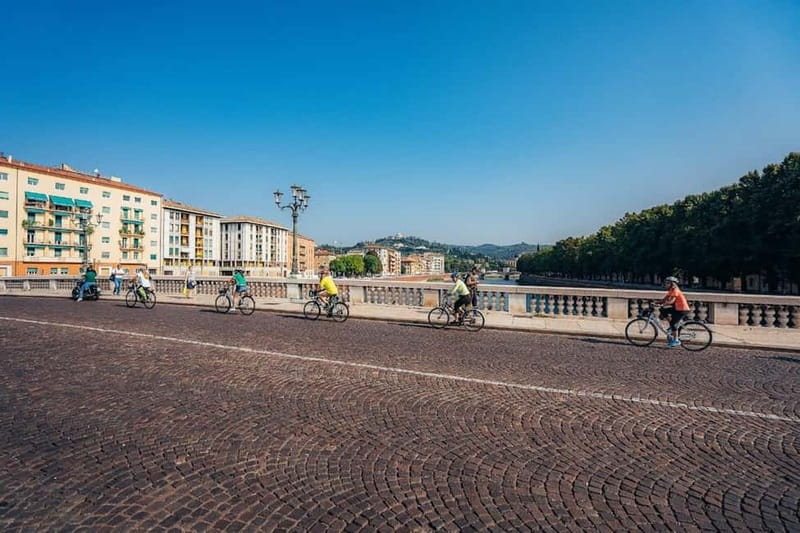 Verona: Classic and Hidden Gems Bike Tour - The first leg: old town squares, walls, and the feel of 2,000 years