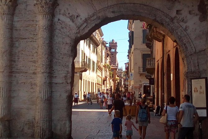 Verona Moonlight Walking Tour - Corso Porta Borsari: history plus humor on the way to the river