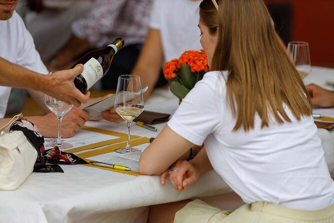 Winery Tour and Tasting of Garda Wines in Lazise - The tasting room spread: 6–8 wines with Garda olive oil and food
